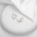 Exagerrated Curved Pearl Earrings